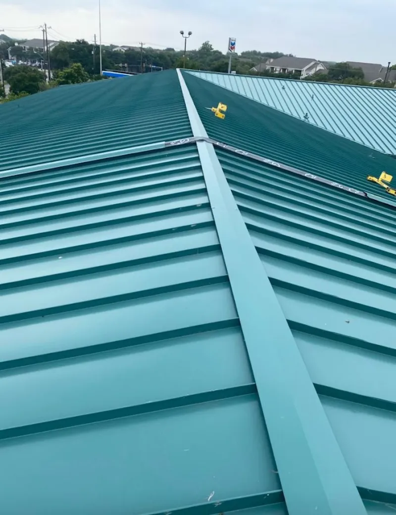 Green commercial metal roof ridge and valley for Metal Roof Repair in Williston