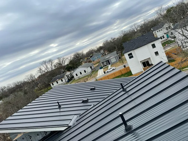 Standing seam metal roof panels with vents for Skylight Repair in Williston